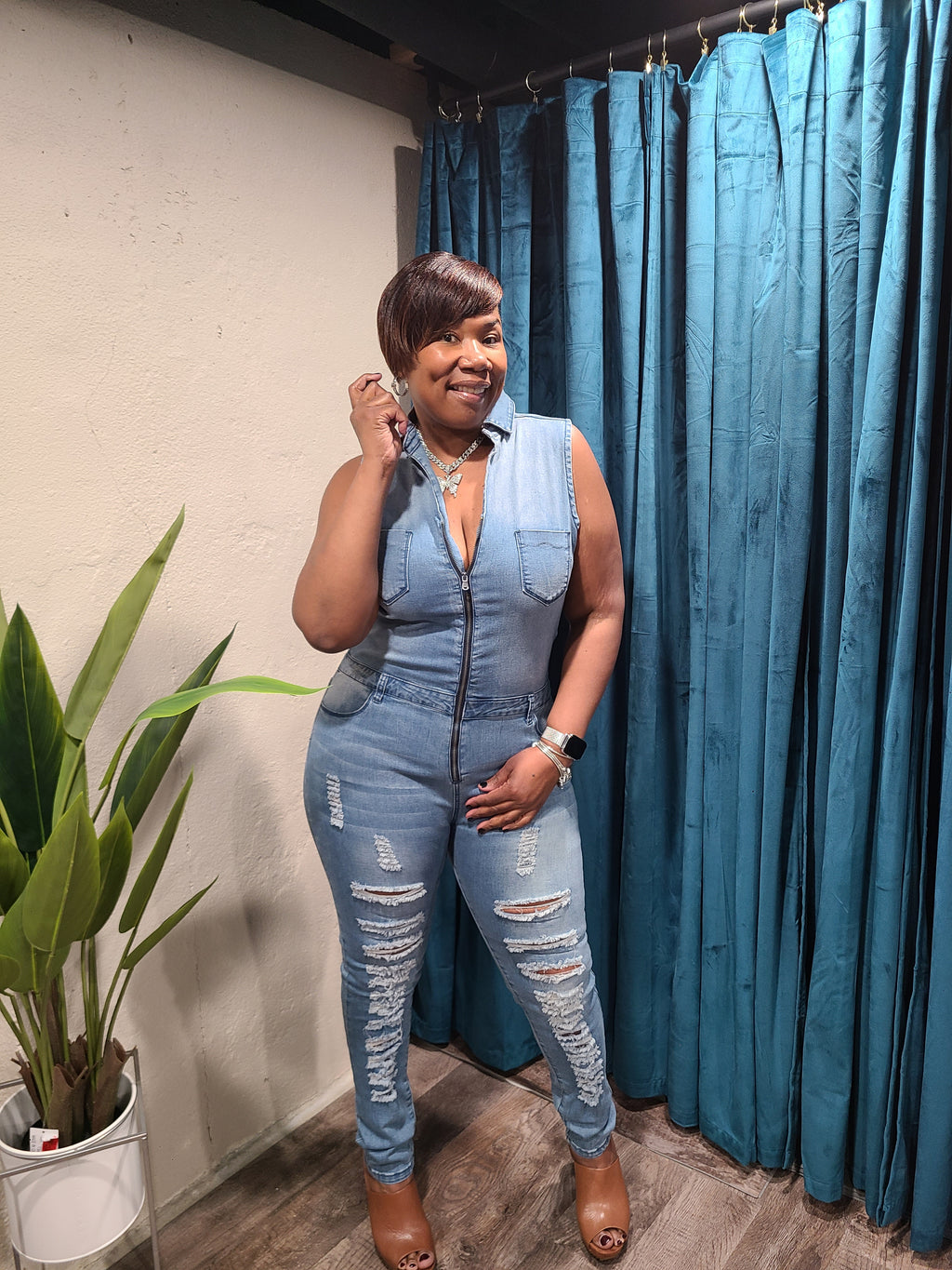 Sleevless Distressed Denim Jumpsuit