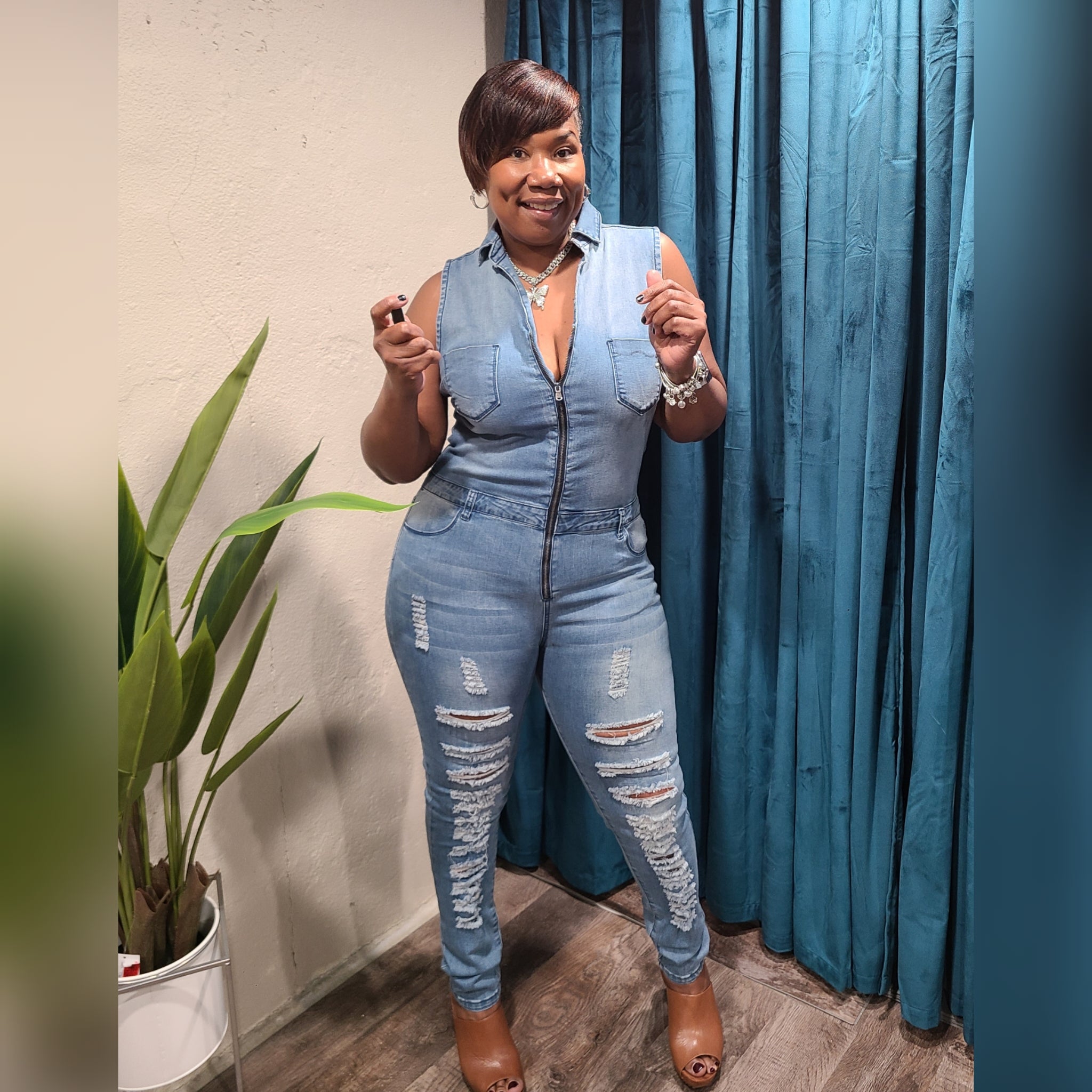 Sleevless Distressed Denim Jumpsuit